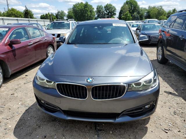 WBA8Z9C55JB220080 - 2018 BMW 330 XIGT GRAY photo 5