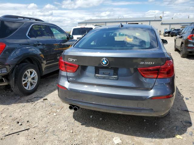 WBA8Z9C55JB220080 - 2018 BMW 330 XIGT GRAY photo 6