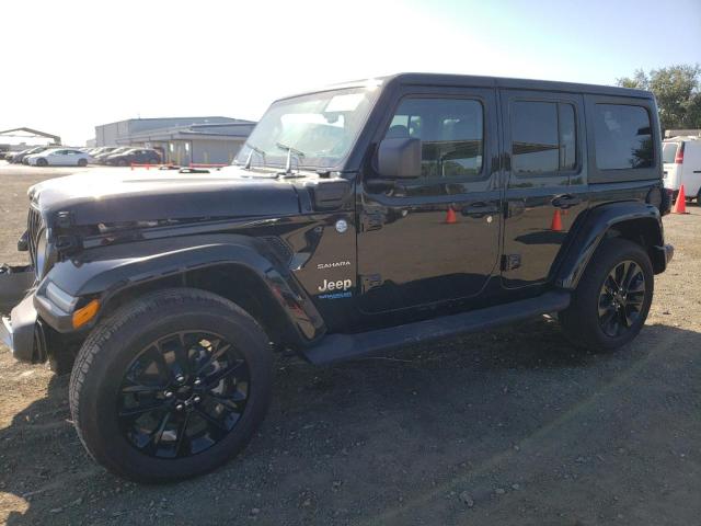 1C4JJXP65NW256384 - 2022 JEEP WRANGLER U SAHARA 4XE BLACK photo 1