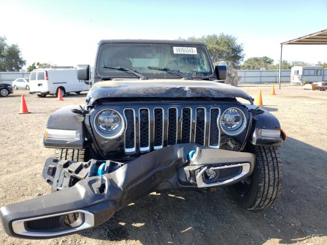 1C4JJXP65NW256384 - 2022 JEEP WRANGLER U SAHARA 4XE BLACK photo 5