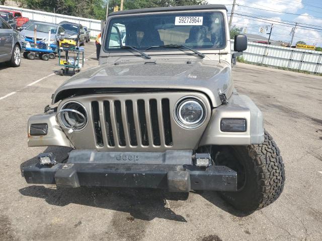 1J4FA49S94P799092 - 2004 JEEP WRANGLER / SPORT GRAY photo 5