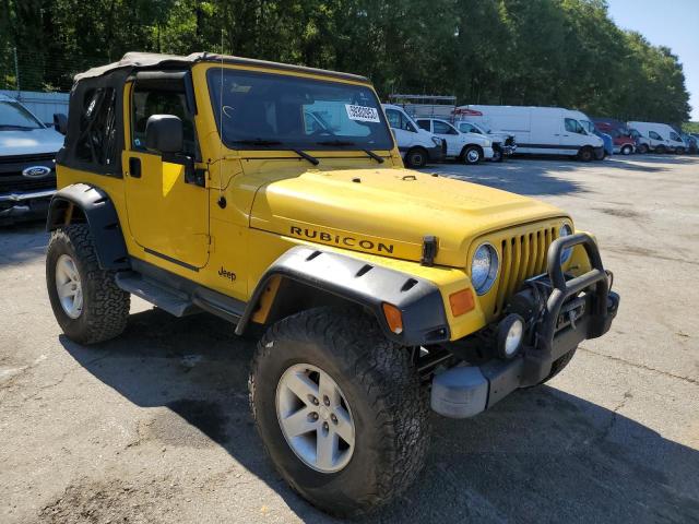 1J4FA69S14P740937 - 2004 JEEP WRANGLER / RUBICON YELLOW photo 4