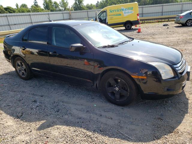 3FAHP07Z09R127644 - 2009 FORD FUSION SE BLACK photo 4