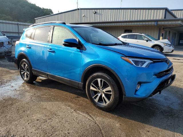 JTMWFREV3HD099130 - 2017 TOYOTA RAV4 XLE BLUE photo 4