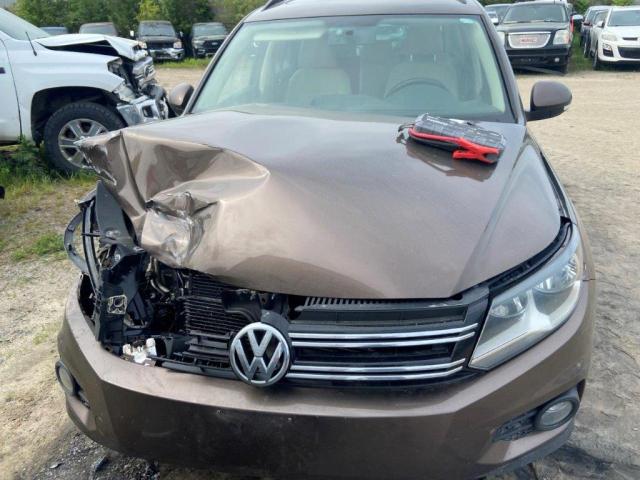 WVGJV7AX5FW034799 - 2015 VOLKSWAGEN TIGUAN S BROWN photo 5