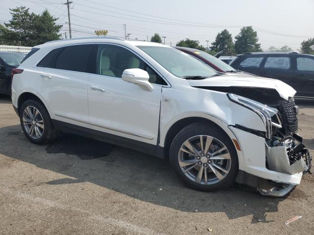 1GYKNDRS6PZ152094 - 2023 CADILLAC XT5 PREMIUM LUXURY WHITE photo 4