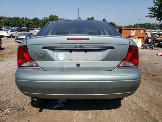 1FAFP34304W132552 - 2004 FORD FOCUS SE COMFORT GREEN photo 6