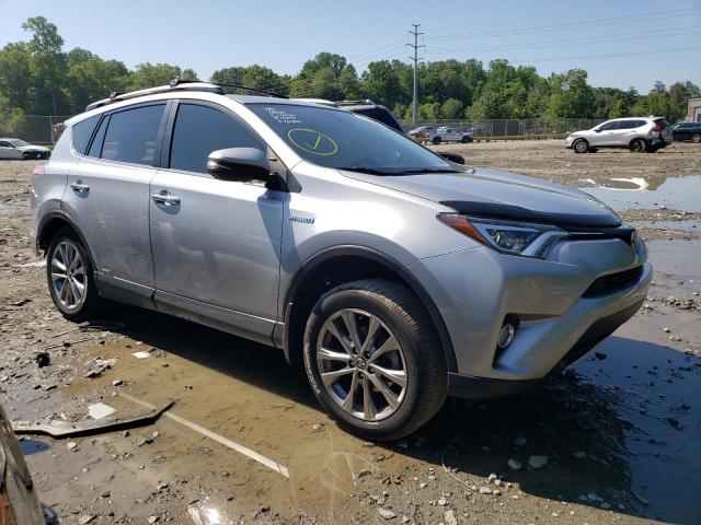 JTMDJREV0JD159778 - 2018 TOYOTA RAV4 HV LIMITED SILVER photo 4