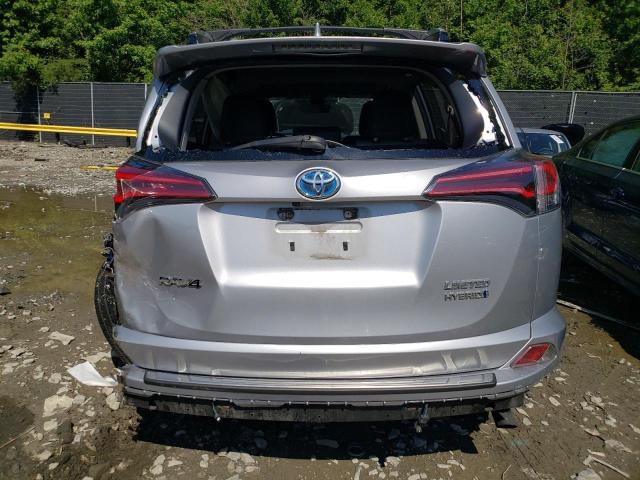 JTMDJREV0JD159778 - 2018 TOYOTA RAV4 HV LIMITED SILVER photo 6