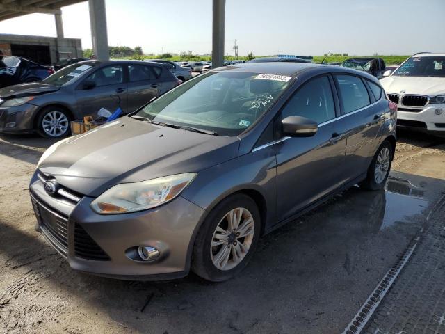 1FAHP3M2XCL274567 - 2012 FORD FOCUS SEL GRAY photo 1