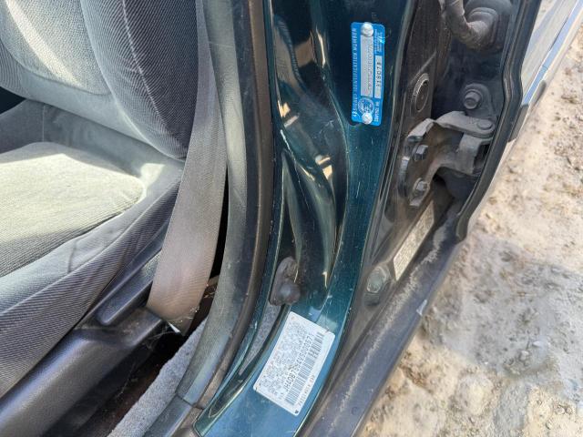 JH4DB7554VS000571 - 1997 ACURA INTEGRA LS GREEN photo 12