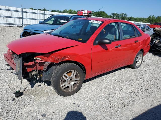 1FAHP34N06W257855 - 2006 FORD FOCUS ZX4 RED photo 1