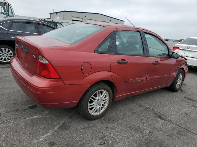 1FAFP34N35W141457 - 2005 FORD FOCUS ZX4 RED photo 3