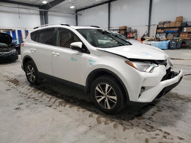 JTMWFREV4HD102388 - 2017 TOYOTA RAV4 XLE WHITE photo 4