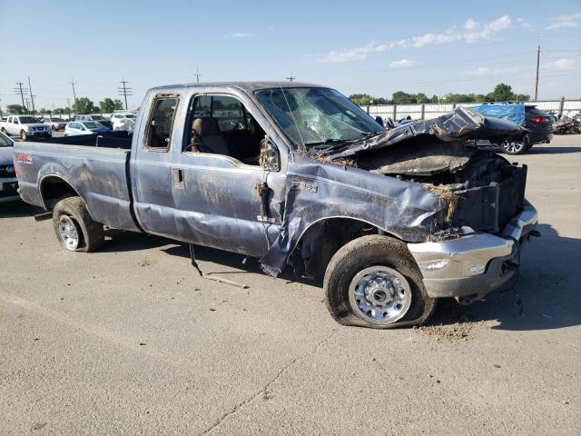 1FTSX31P04EA55557 - 2004 FORD F350 SRW SUPER DUTY BLUE photo 4