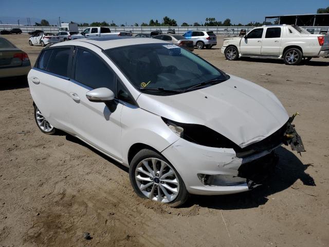 3FADP4FJ5HM139057 - 2017 FORD FIESTA TITANIUM WHITE photo 4