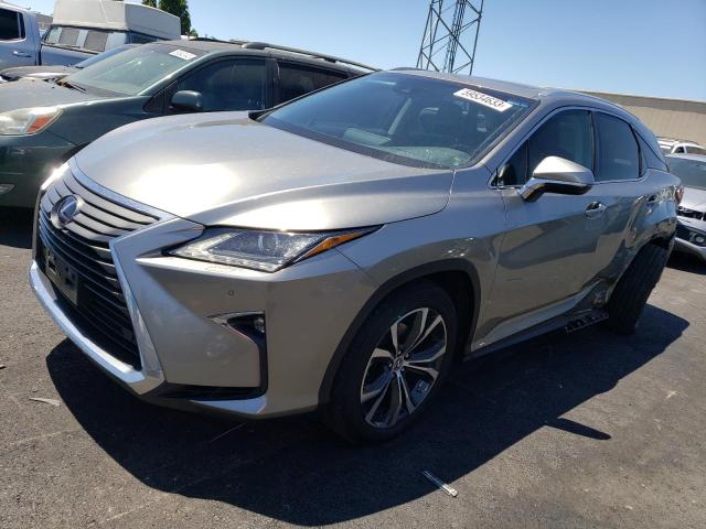 2T2BGMCA8KC031100 - 2019 LEXUS RX 450H BASE GRAY photo 1