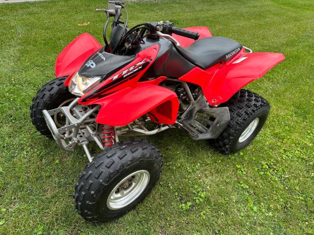 1HFTE270974602422 - 2007 HONDA TRX250 EX RED photo 2