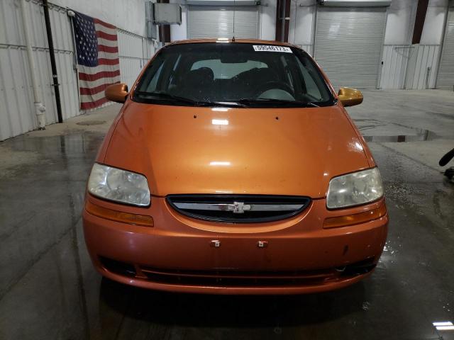 KL1TD62695B405993 - 2005 CHEVROLET AVEO BASE ORANGE photo 5