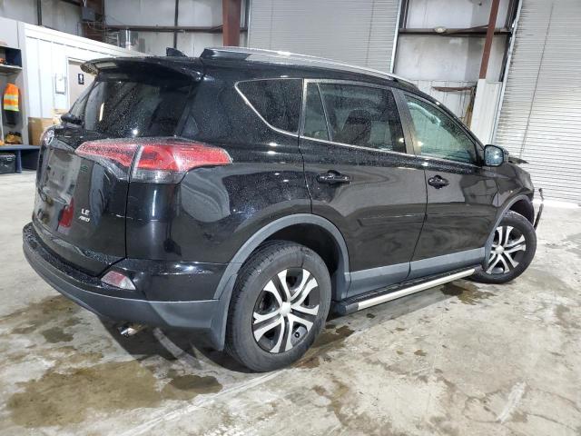2T3BFREV0JW731394 - 2018 TOYOTA RAV4 LE Qara foto 3