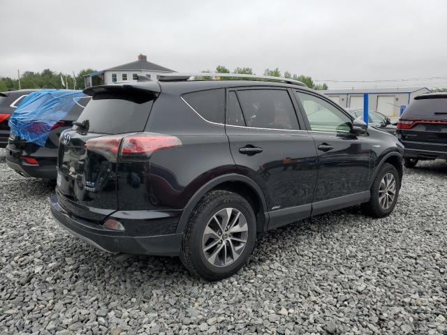 JTMRJREV5HD095320 - 2017 TOYOTA RAV4 HV LE Schwarz Foto 3