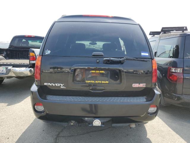 1GKES66M766120482 - 2006 GMC ENVOY DENALI XL BLACK photo 6