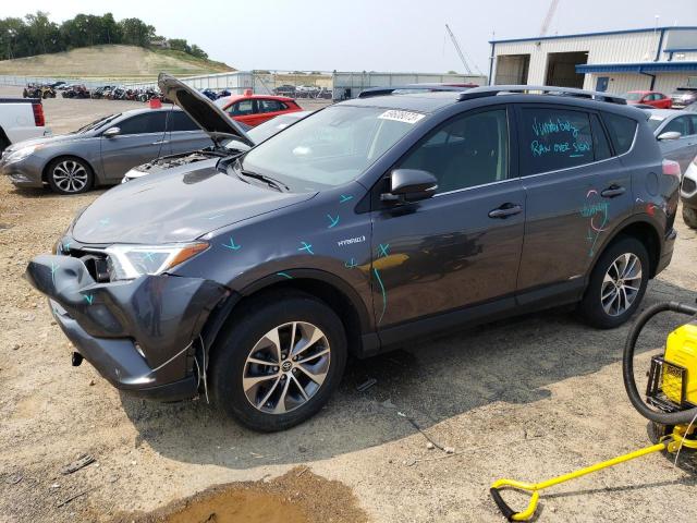 JTMRJREV1JD236132 - 2018 TOYOTA RAV4 HV LE CHARCOAL photo 1