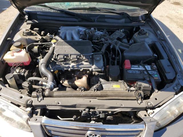 4T1BF28K1YU090655 - 2000 TOYOTA CAMRY LE GOLD photo 11