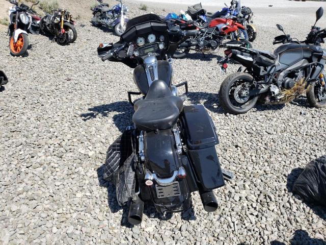 1HD1KB414AB629634 - 2010 HARLEY-DAVIDSON FLHX შავი ფოტო 4