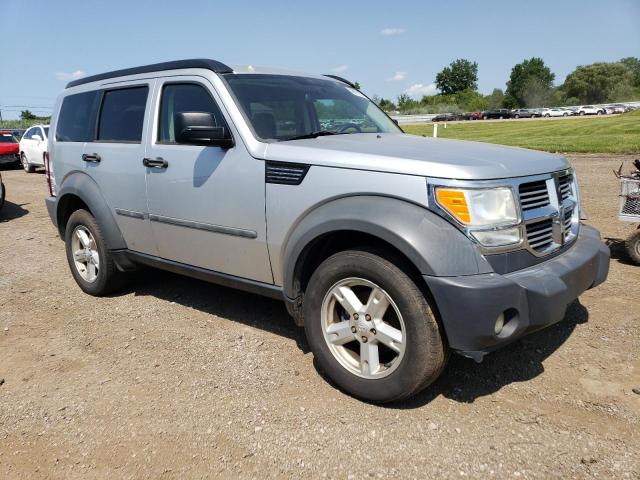 1D8GU28K87W643175 - 2007 DODGE NITRO SXT SILVER photo 4