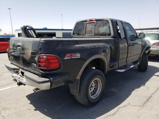 1FTRX08LX2KB15892 - 2002 FORD F150 BLACK photo 4