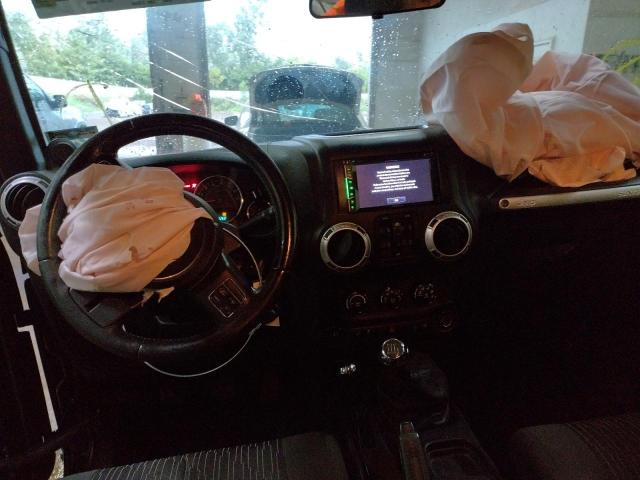 1C4BJWEG8CL262365 - 2012 JEEP WRANGLER U SAHARA BLACK photo 9