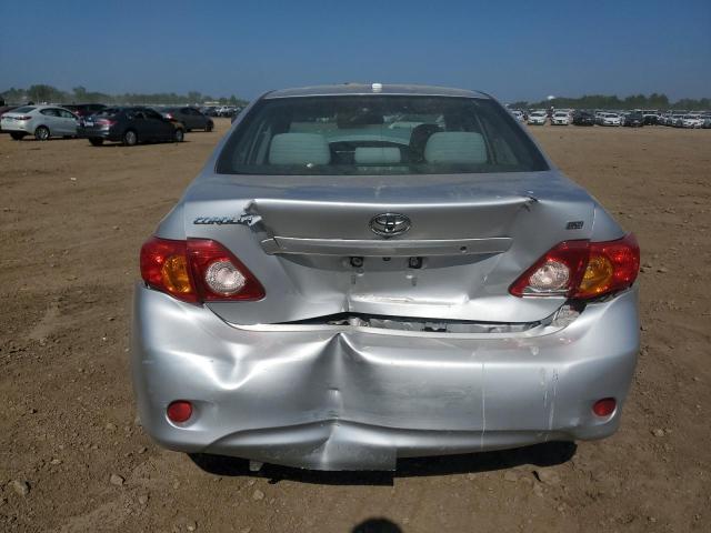 1NXBU40EX9Z016630 - 2009 TOYOTA COROLLA BASE Silber Foto 6
