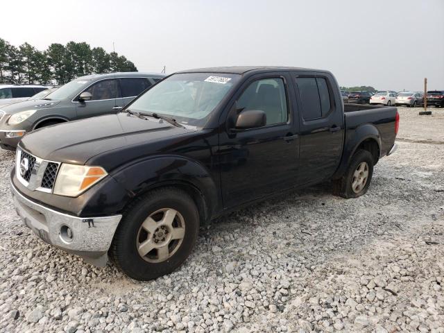 1N6AD07U46C412492 - 2006 NISSAN FRONTIER CREW CAB LE BLACK photo 1