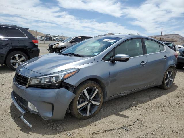 3KPFL4A88HE007035 - 2017 KIA FORTE EX GRAY photo 1