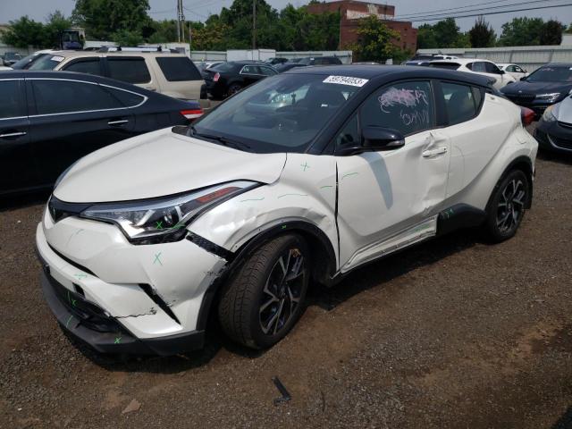 NMTKHMBX9KR093974 - 2019 TOYOTA C-HR XLE WHITE photo 1