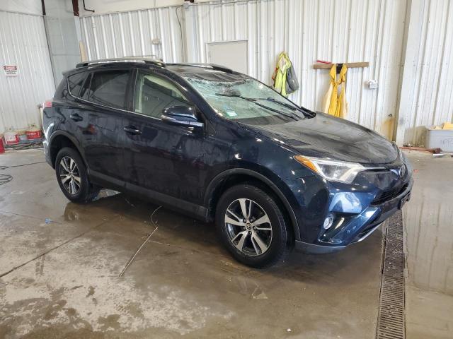 JTMRFREV6HJ704739 - 2017 TOYOTA RAV4 XLE BLUE photo 4