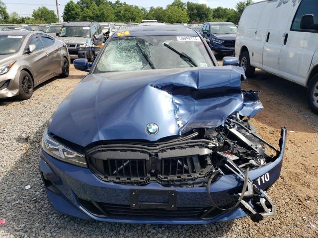 3MW89FF09R8D90406 - 2024 BMW 330XI Blau Foto 5