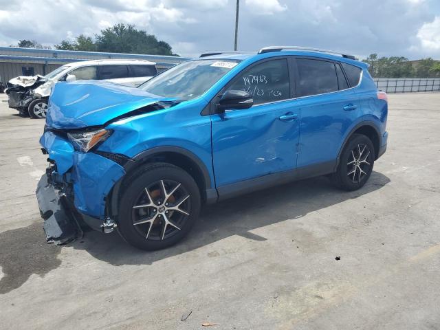 JTMNFREV1HJ147463 - 2017 TOYOTA RAV4 SE BLUE photo 1