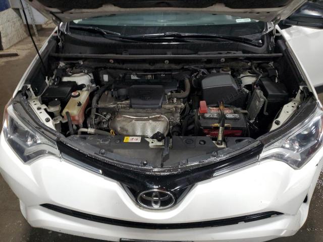 JTMBFREV5JJ732975 - 2018 TOYOTA RAV4 LE WHITE photo 11