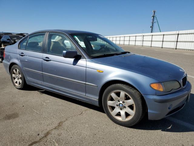 WBAAZ33475KP92019 - 2005 BMW 325 IS SULEV BLUE photo 4