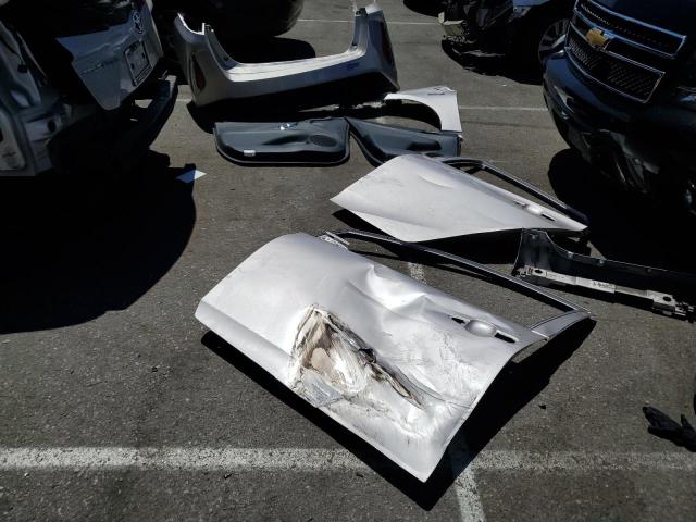 JTDKARFP4K3111425 - 2019 TOYOTA PRIUS PRIM SILVER photo 12