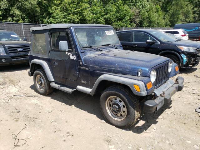 1J4FA29P4YP711071 - 2000 JEEP WRANGLER / SE BLUE photo 4