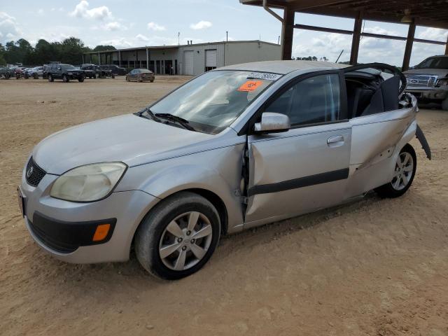 KNADE223496518416 - 2009 KIA RIO BASE GRAY photo 1