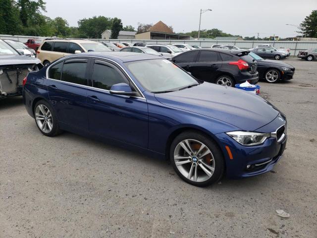 WBA8D9C5XJEM33426 - 2018 BMW 330 XI BLUE photo 4