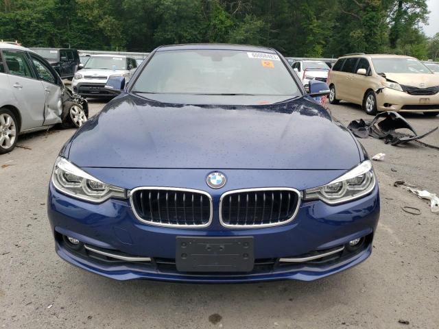 WBA8D9C5XJEM33426 - 2018 BMW 330 XI BLUE photo 5