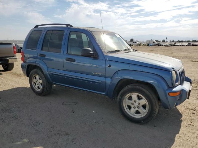 1J4GL58KX4W188421 - 2004 JEEP LIBERTY LIMITED BLUE photo 4