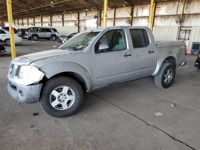 1N6AD07U45C420316 - 2005 NISSAN FRONTIER CREW CAB LE SILVER photo 1