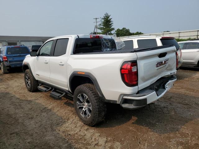 1GTP6DEK0P1170877 - 2023 GMC CANYON AT4 WHITE photo 2