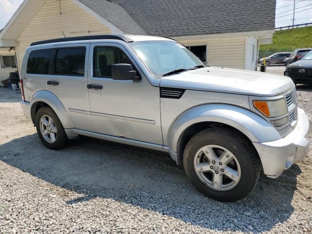 1D4PU5GK2BW565053 - 2011 DODGE NITRO SXT SILVER photo 4